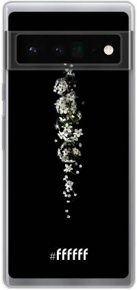 White flowers in the dark Pixel 6 Pro