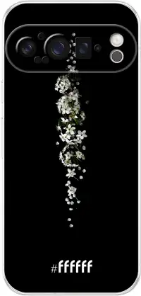 White flowers in the dark Pixel 9 Pro