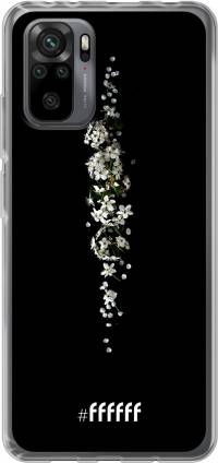 White flowers in the dark Redmi Note 10 Pro